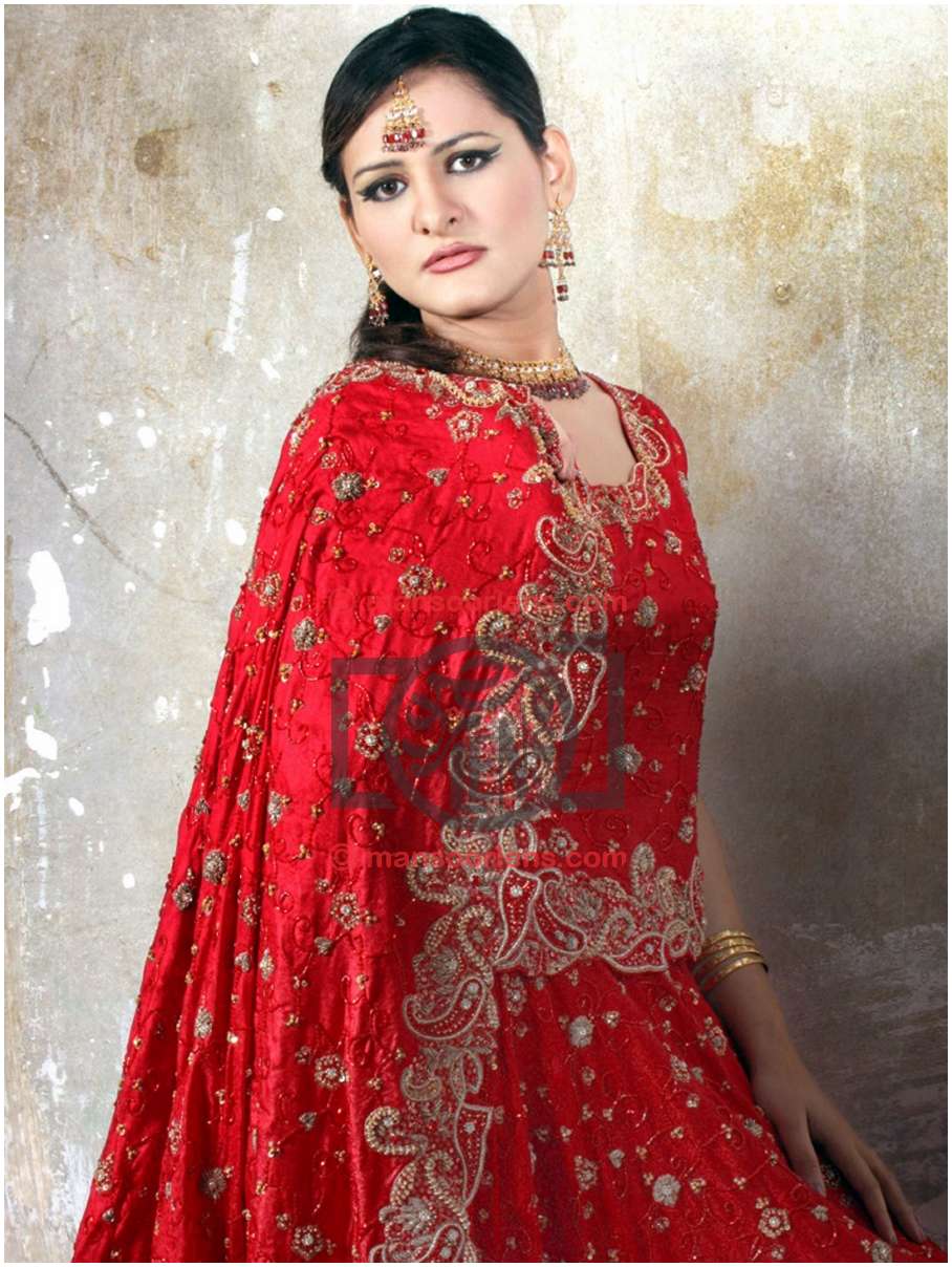 Woman in Traditional Red Embroidered Bridal Dres