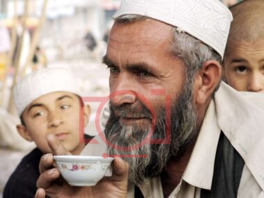 Elderly Man Enjoying Tea